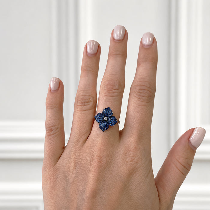 Approx. 0.93 carats Round Blue Sapphires

0.03 carats Round Diamonds
Set in 18K White Gold