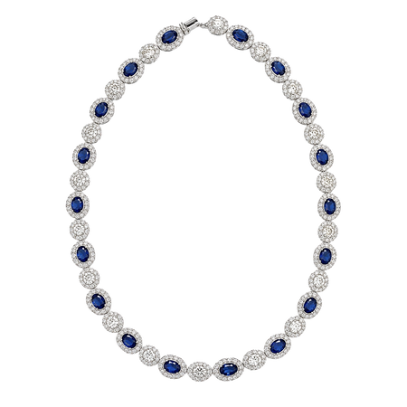 Approx 18.50 carats Oval Blue Sapphires
17.01 carats Round Oval Diamonds
Necklace set in 18K White Gold
Size 16 in