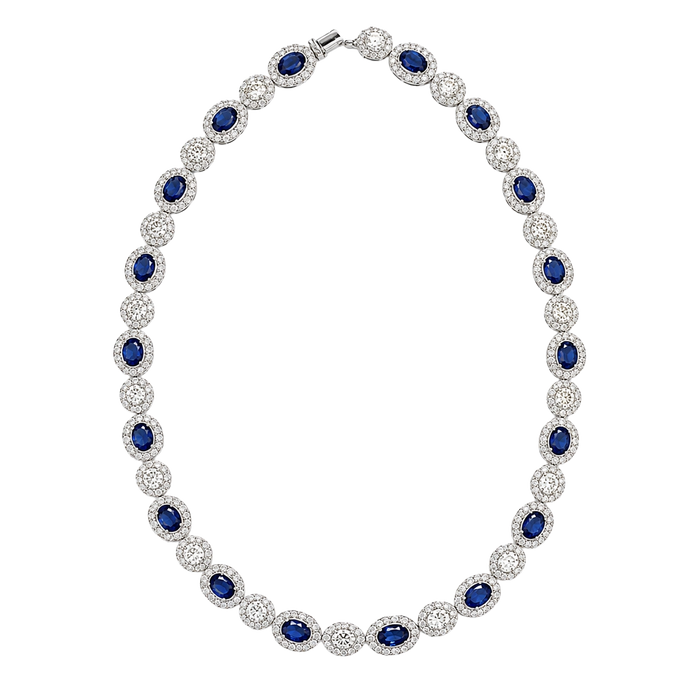 Approx 18.50 carats Oval Blue Sapphires
17.01 carats Round Oval Diamonds
Necklace set in 18K White Gold
Size 16 in