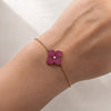 1.02 carats Deep&nbsp;Pink Sapphires
0.04 carats&nbsp;Center Round White Diamond
Bracelet&nbsp;Set in 18K Rose and Black&nbsp;Gold
Flower Motif: 12mm X 12mm
Bracelet Length 6.75 inches