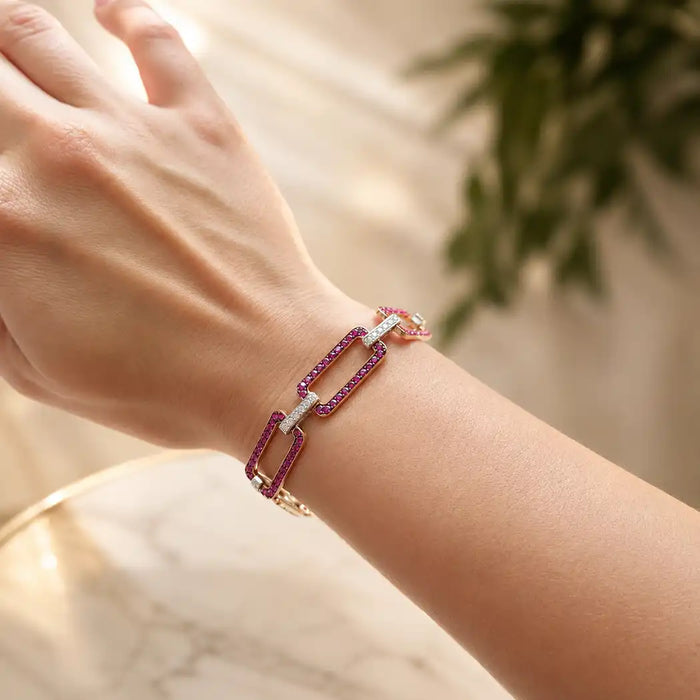 Flat Link Bracelet in Deep Pink Sapphire approx. 5.17 carats Round Diamond Bracelet set in 18K White Gold, 18K Rose Gold and the stones are set in 18K Blackened Gold.