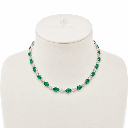 Approx 31.75 carats Oval Emerald&nbsp;
6.50 carats Round Diamonds
Necklace set in 18K White Gold