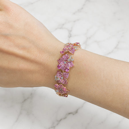 Approx. 15.30 carats Round Oval Pink Sapphires&nbsp;
1.34 carats Round Diamonds&nbsp;
Bracelet set in 18K Rose Gold&nbsp;
6.75 in