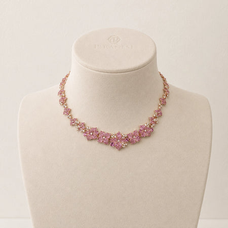 Approx. 15.28 carats Pink Round Oval&nbsp;
2.36 carats Round Diamonds&nbsp;
Necklace set in 18K Rose Gold