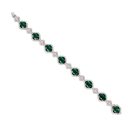 Approx. 8.62 carats Oval Emeralds&nbsp;
3.57 carats Round Diamonds&nbsp;
Bracelet set in 18K White Gold&nbsp;
6.75 in