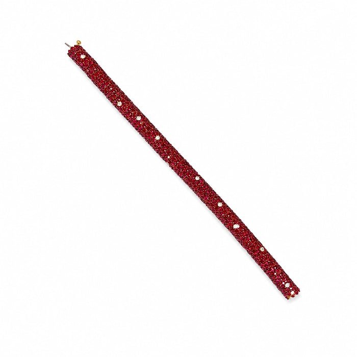 Approx. 36.83 carats Round Rubies&nbsp;
0.84 carats Round Diamonds&nbsp;
Bracelet set in 18K Yellow Gold
7.75 in&nbsp;