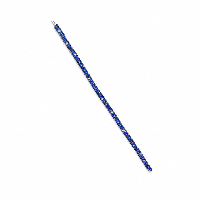 Approx. 10.56 carats Round Blue Sapphires&nbsp;
0.70 carats Round Diamonds&nbsp;
Set in 18K White Gold&nbsp;
7.25 in