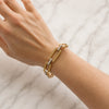 Approx. 4.92 carats Round Orange Sapphires
0.89 carats Round Diamonds

Bracelet set in 18K Yellow Gold