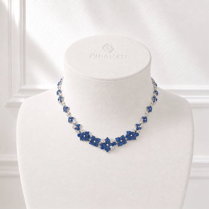Approx. 15.51 carats Round and Oval Blue Sapphires
1.98 carats Round Diamonds
Set in 18K White and Blackened Gold