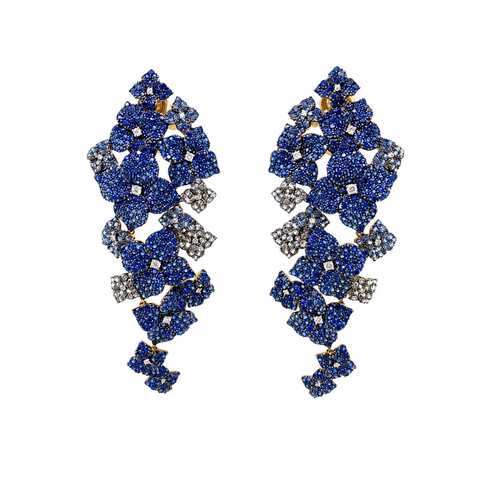 Approx. 16.80 carats Round and Oval Blue Sapphires
0.50 carats Round Diamonds
Set in 18K Yellow, White, and Blackened Gold