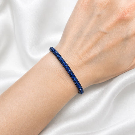 Approx. 3.15 carats Round Blue Sapphires
Set in 18K White Gold
53 x 46 mm
