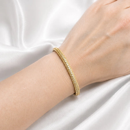 Approx. 2.95 carats Round Yellow Sapphires
Set in 18K Yellow Gold