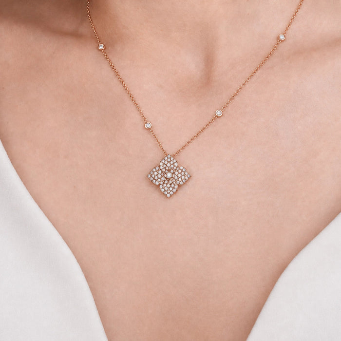 Approx. 1.90 carats Round White Diamonds
Pendant Set in 18K Rose Gold
Diamond Chain Included
Pendant Measures: 17mm X 17mm
Necklace Measures: 18 inches