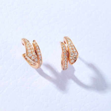 Approx. 0.85 carats of round diamonds
Earring is set in 18K Rose Gold
For pierced ears