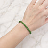 Approx. 10.21 carats Round Green Tsavorites
0.79 carats Round Diamonds
Set in 18K Yellow Gold
7.25 in
