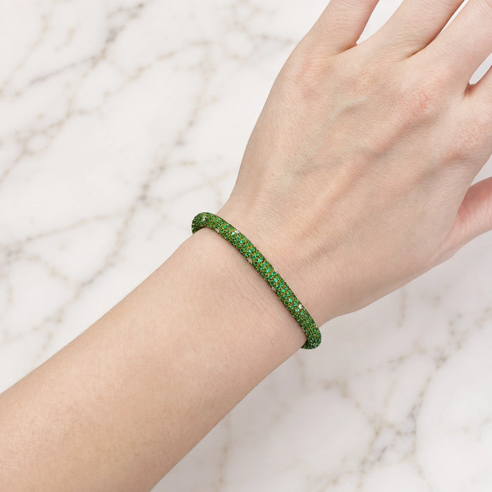 Approx. 10.21 carats Round Green Tsavorites
0.79 carats Round Diamonds
Set in 18K Yellow Gold
7.25 in