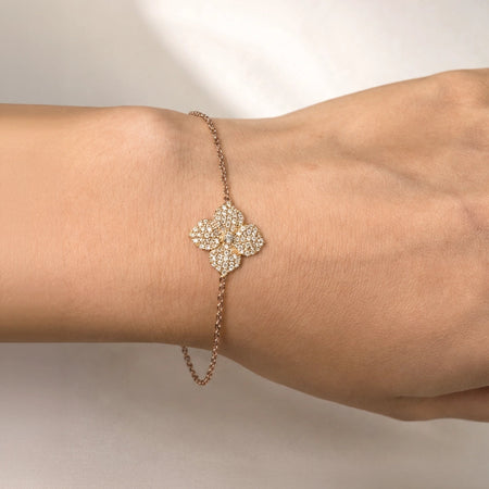 0.79 carats Round White Diamonds
Bracelet Set in 18K Rose Gold
Flower Motif: 12mm X 12mm
Bracelet Length 6.75 inches