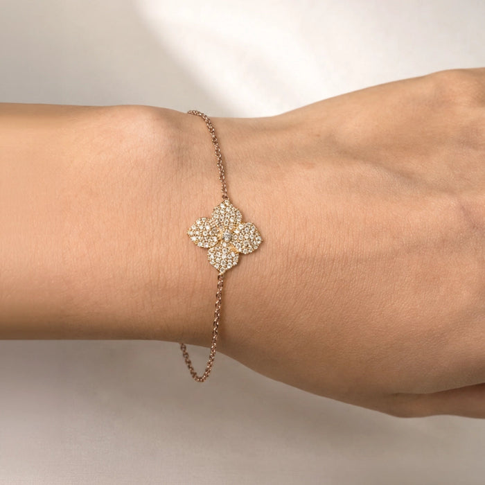 0.79 carats Round White Diamonds
Bracelet Set in 18K Rose Gold
Flower Motif: 12mm X 12mm
Bracelet Length 6.75 inches