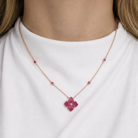 Approx. 1.80 carats Round Deep Pink Sapphires
Diamond Center
Pendant Set in 18K Rose and Black Gold
Color Stone Chain Included
Pendant Measures: 12mm X 12mm
Necklace Measures: 17 inches