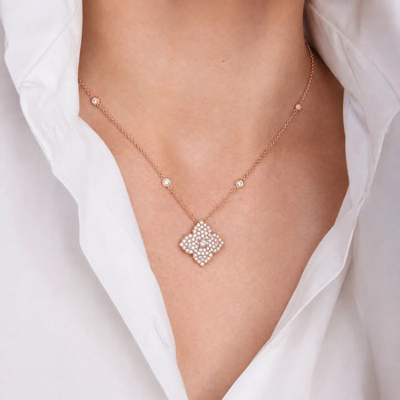 Approx. 1.30 carats Round White Diamonds
Pendant Set in 18K Rose Gold
Diamond Chain Included
Pendant Measures: 12mm X 12mm
Necklace Measures: 17 inches