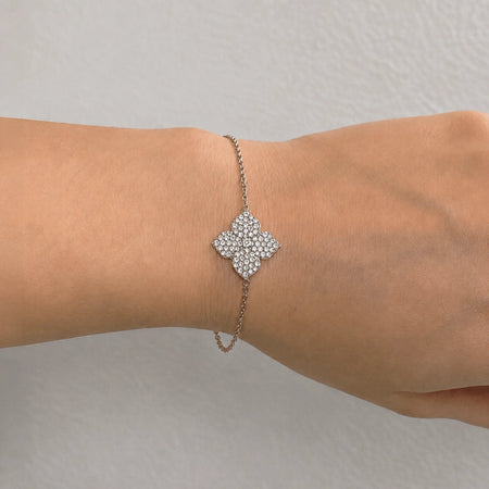 0.79 carats Round White Diamonds
Bracelet&nbsp;Set in&nbsp;18K White Gold
Flower Motif: 12mm X 12mm
Bracelet Length 6.75 inches