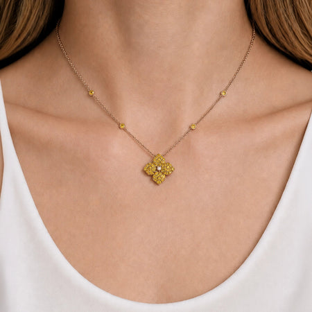 Approx. 1.70 carats Round Yellow Sapphires
Diamond Center
Pendant Set in 18K Yellow Gold
Color Stone Chain Included
Pendant Measures: 12mm X 12mm
Necklace Measures: 17 inches