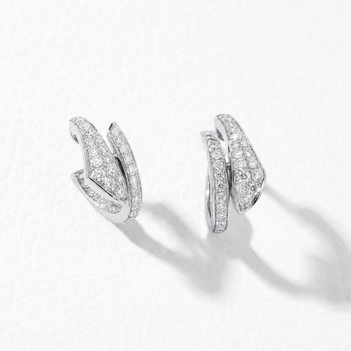 Approx. 0.85 carats of round diamonds
Earring is set in 18K White Gold
For pierced ears