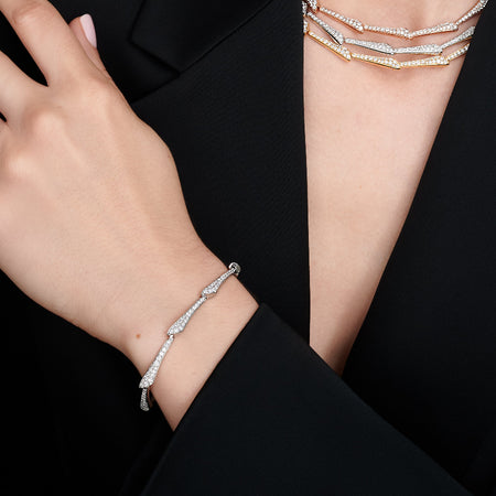 Approx. 2.20 carats of round diamonds
Bracelet is set in 18K White Gold

Measures 6.75 inches in length