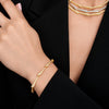 Approx. 2.20 carats of round diamonds
Bracelet is set in 18K Yellow Gold

Measures 6.75 inches in length