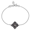 0.86 carats Round Black Diamonds
0.04 carats&nbsp;Center Round White Diamond
Bracelet&nbsp;Set in 18K White Gold
Flower Motif: 12mm X 12mm
Bracelet Length 6.75 inches